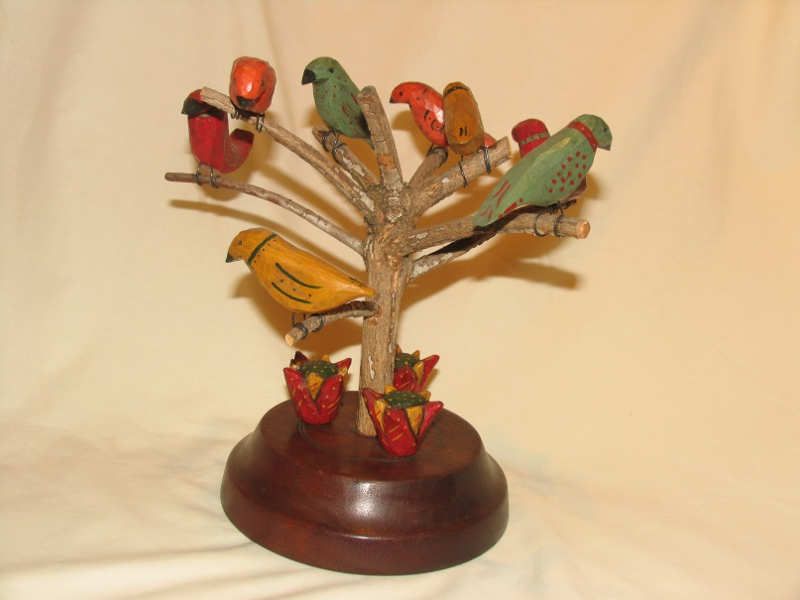 Birds in a tree wood carving by Paul Hoch