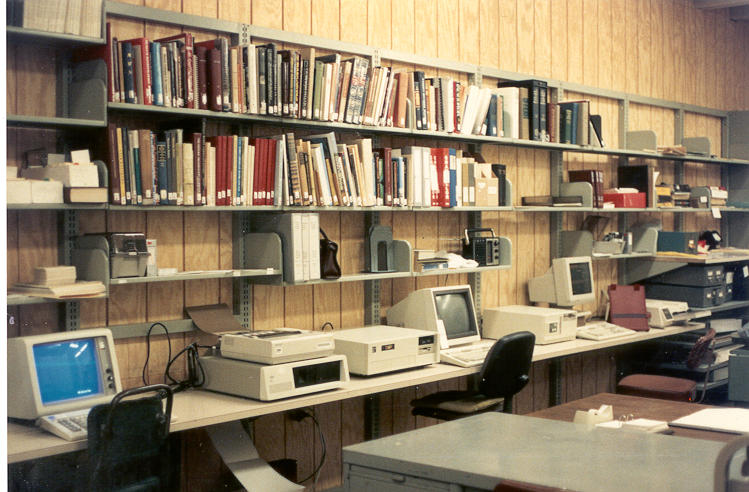 Old Computers and Bookshelves to show past